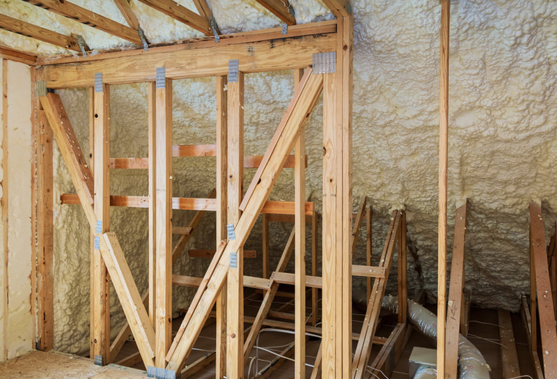 Walls and ceiling with closed cell spray foam insulation